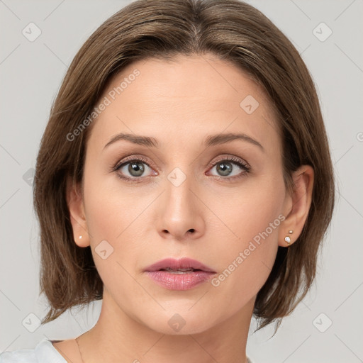 Neutral white young-adult female with medium  brown hair and grey eyes