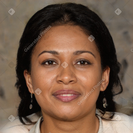 Joyful black adult female with medium  brown hair and brown eyes