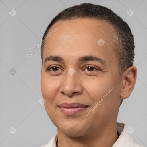 Joyful white adult male with short  brown hair and brown eyes