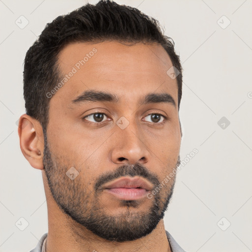 Neutral latino young-adult male with short  brown hair and brown eyes