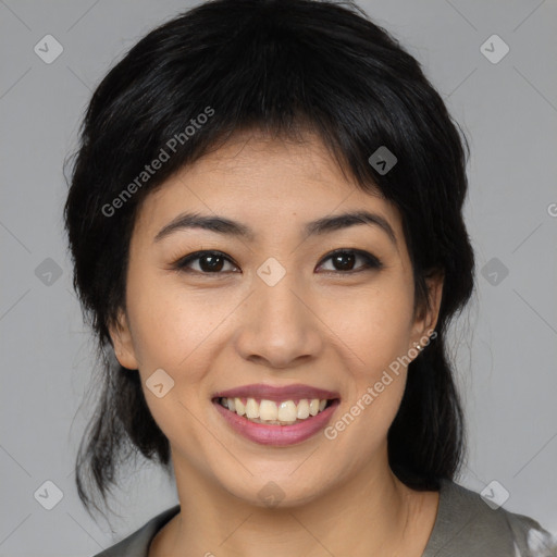 Joyful asian young-adult female with medium  black hair and brown eyes