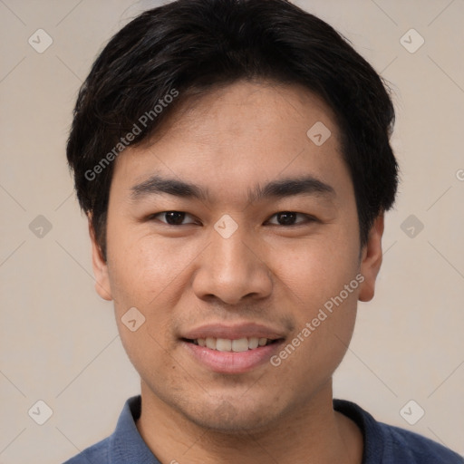 Joyful white young-adult male with short  black hair and brown eyes