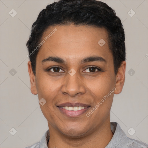 Joyful latino young-adult male with short  black hair and brown eyes