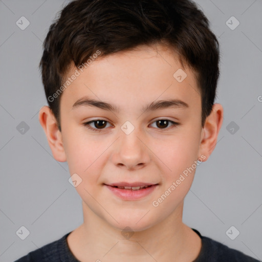 Joyful white child male with short  brown hair and brown eyes