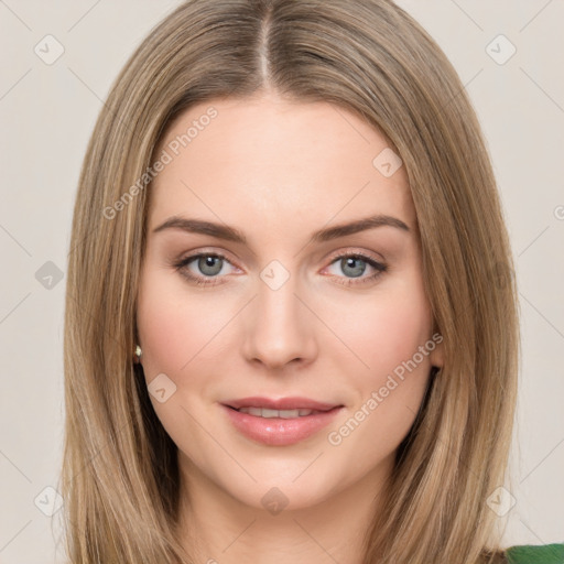 Joyful white young-adult female with medium  brown hair and green eyes