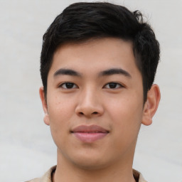 Neutral asian young-adult male with short  brown hair and brown eyes