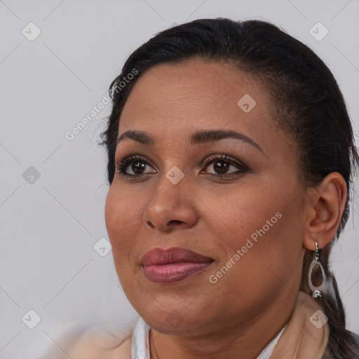 Joyful black young-adult female with medium  brown hair and brown eyes