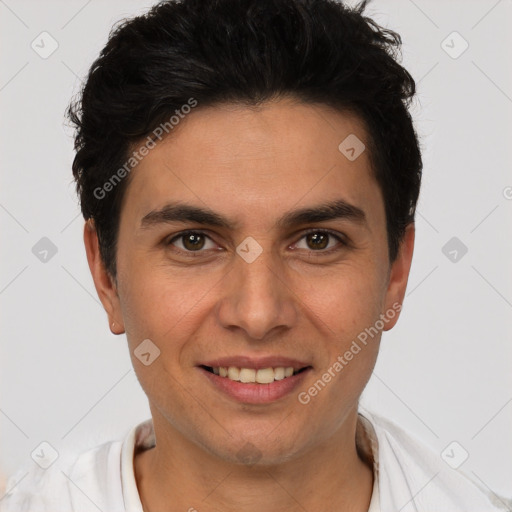 Joyful white young-adult male with short  black hair and brown eyes