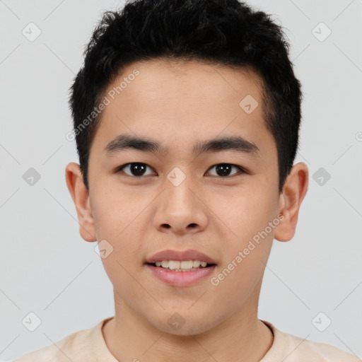 Joyful asian young-adult male with short  brown hair and brown eyes