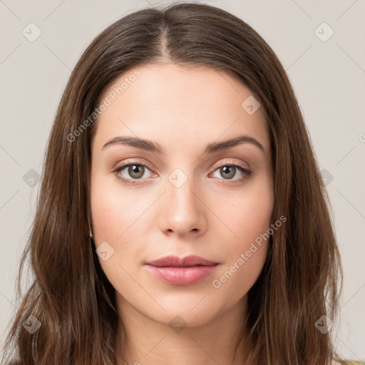 Neutral white young-adult female with long  brown hair and brown eyes