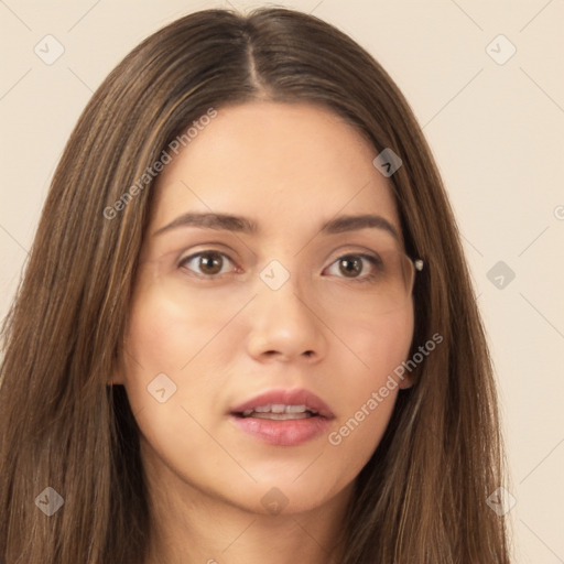 Neutral white young-adult female with long  brown hair and brown eyes