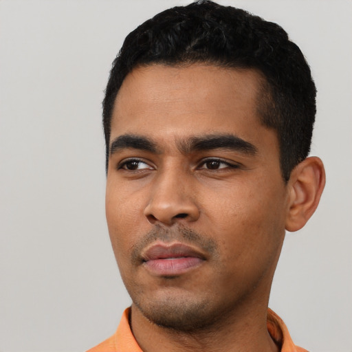 Neutral latino young-adult male with short  black hair and brown eyes