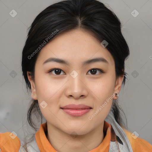 Joyful asian young-adult female with medium  brown hair and brown eyes