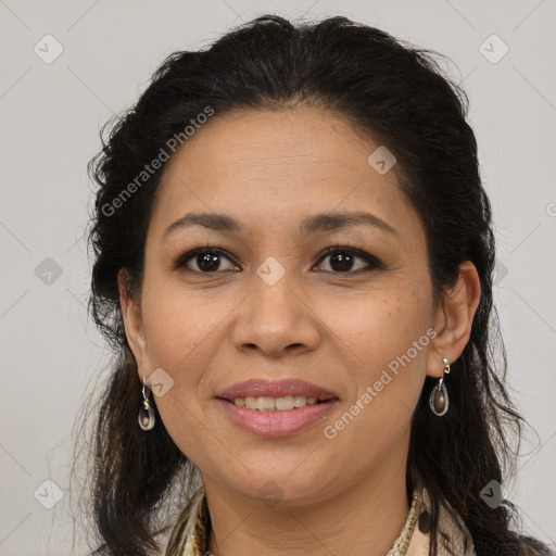 Joyful white adult female with long  brown hair and brown eyes