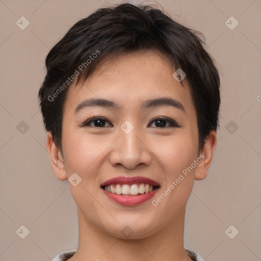 Joyful asian young-adult female with short  brown hair and brown eyes