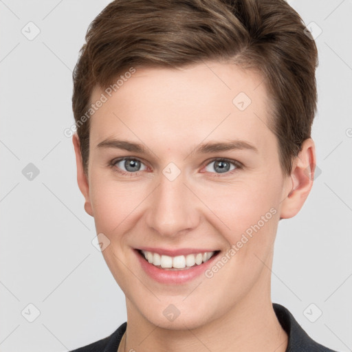 Joyful white young-adult female with short  brown hair and grey eyes