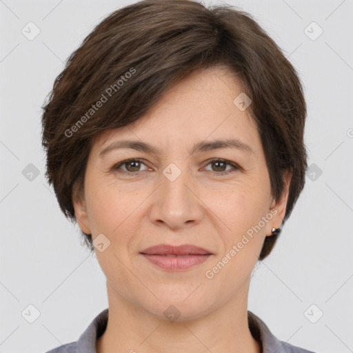 Joyful white adult female with medium  brown hair and brown eyes