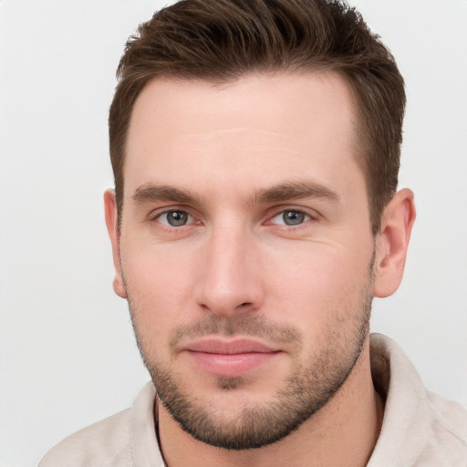 Neutral white young-adult male with short  brown hair and grey eyes