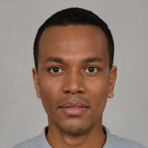 Neutral black young-adult male with short  black hair and brown eyes