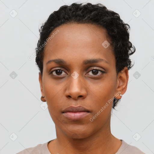 Neutral black young-adult female with short  black hair and brown eyes