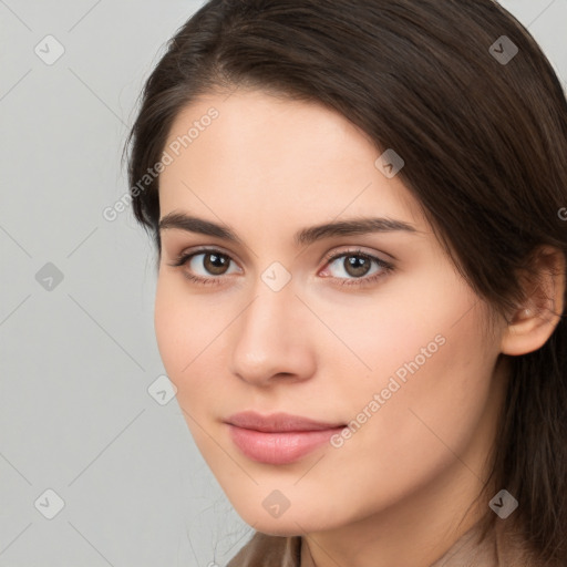 Neutral white young-adult female with medium  brown hair and brown eyes