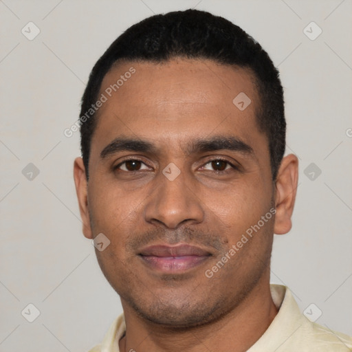 Joyful latino young-adult male with short  black hair and brown eyes