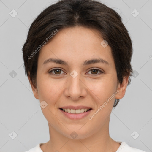 Joyful white young-adult female with short  brown hair and brown eyes