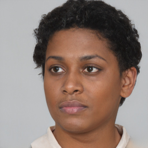 Neutral black young-adult female with short  brown hair and brown eyes