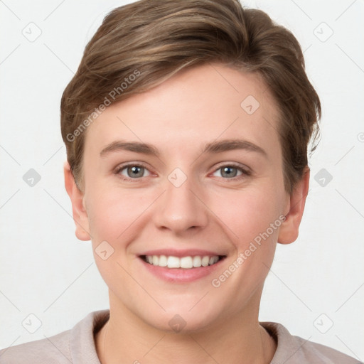 Joyful white young-adult female with short  brown hair and grey eyes