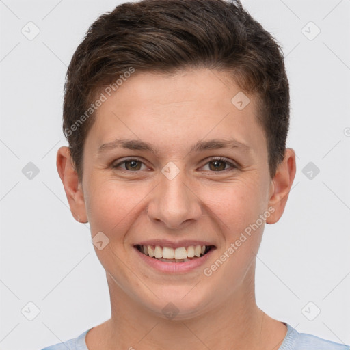 Joyful white young-adult female with short  brown hair and grey eyes