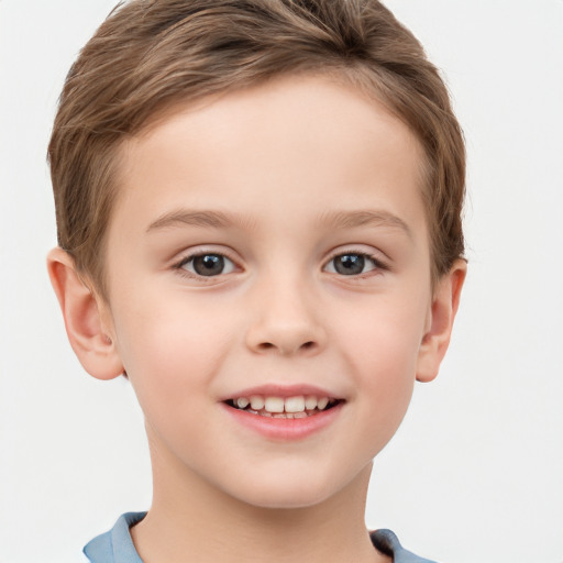 Joyful white child female with short  brown hair and brown eyes