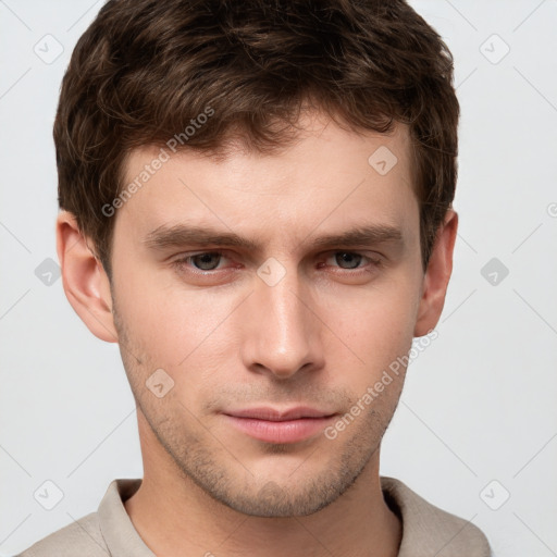 Neutral white young-adult male with short  brown hair and grey eyes