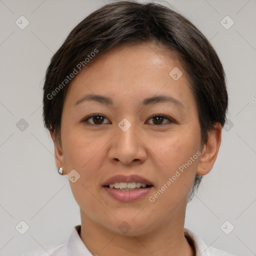 Joyful asian young-adult female with short  brown hair and brown eyes