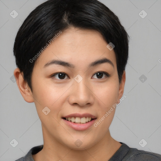 Joyful asian young-adult female with short  black hair and brown eyes