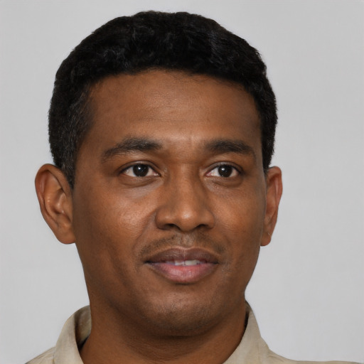 Neutral black young-adult male with short  black hair and brown eyes
