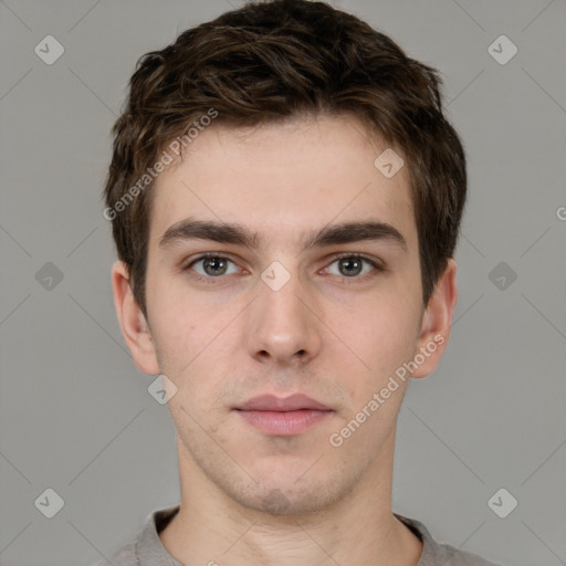 Neutral white young-adult male with short  brown hair and brown eyes