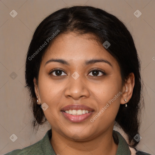 Joyful latino young-adult female with medium  black hair and brown eyes