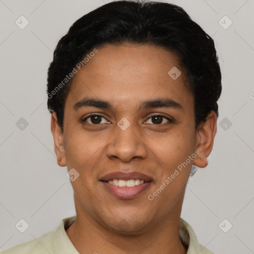Joyful latino young-adult male with short  black hair and brown eyes
