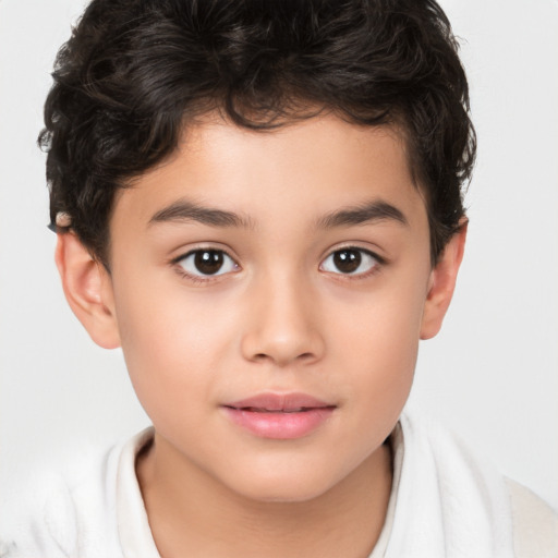 Joyful white child male with short  brown hair and brown eyes