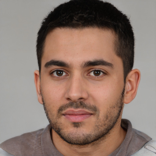 Neutral white young-adult male with short  brown hair and brown eyes