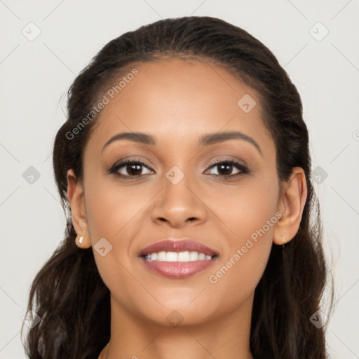 Joyful latino young-adult female with long  brown hair and brown eyes