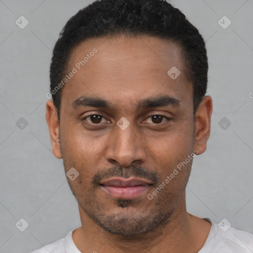 Neutral latino young-adult male with short  black hair and brown eyes