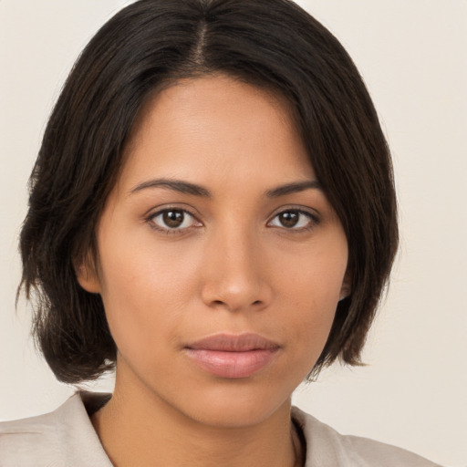 Neutral asian young-adult female with medium  brown hair and brown eyes