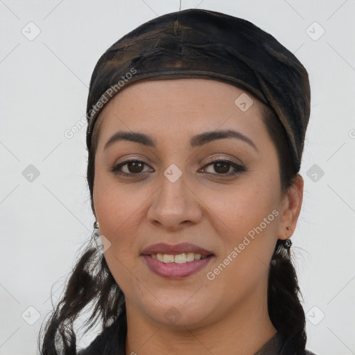 Joyful white young-adult female with long  black hair and brown eyes