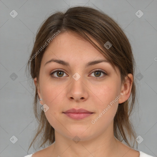 Neutral white young-adult female with medium  brown hair and brown eyes