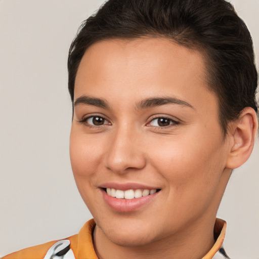 Joyful white young-adult female with short  brown hair and brown eyes