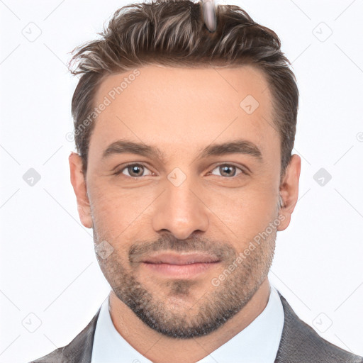 Joyful white adult male with short  brown hair and brown eyes