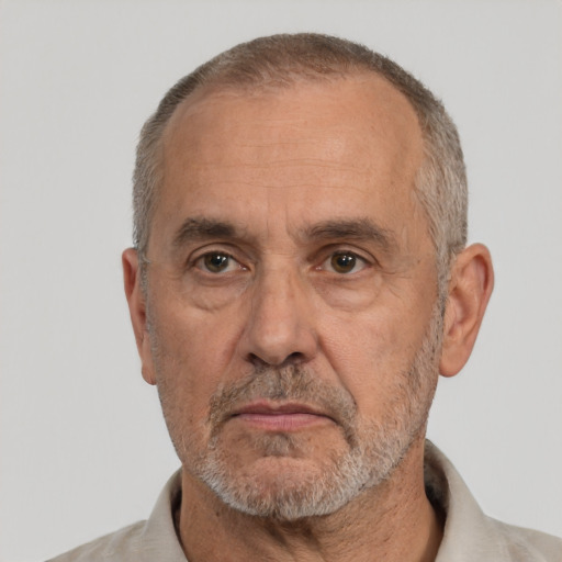 Neutral white middle-aged male with short  gray hair and brown eyes