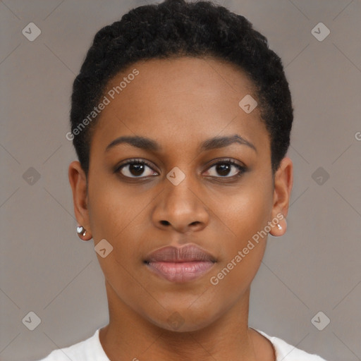 Joyful black young-adult female with short  black hair and brown eyes