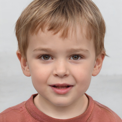 Joyful white child male with short  brown hair and brown eyes